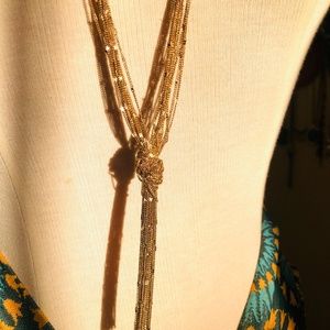 Gold-toned long tassel shimmer chain necklace